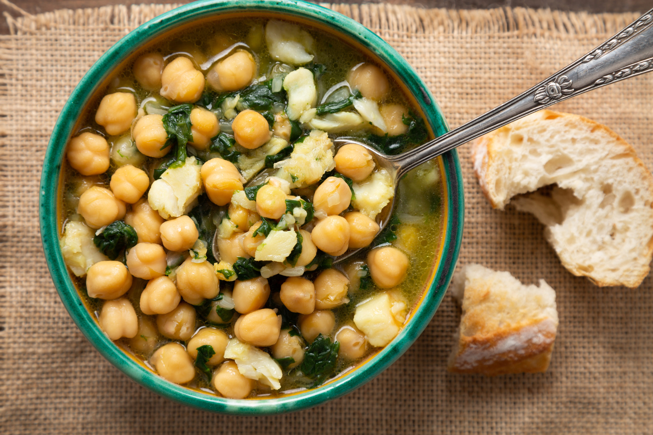 Chickpea soup with spinach and cod